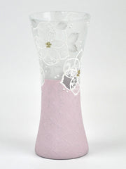 White flowers on ligth pink glass vase